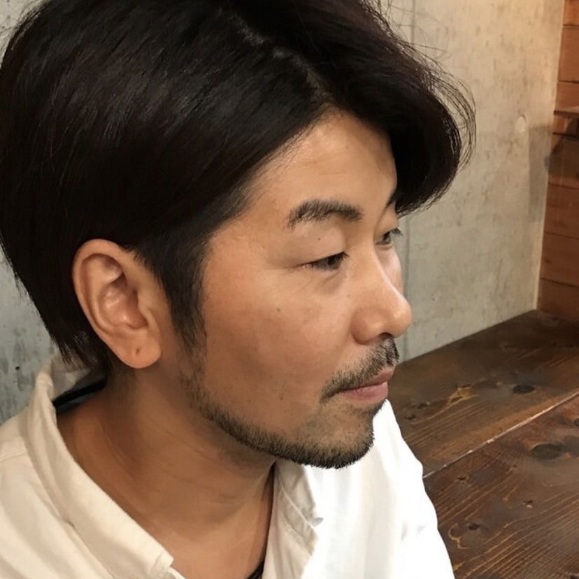 店長　新井満夫